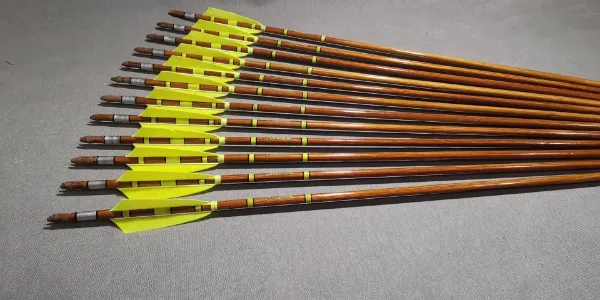 Picture of Wooden Archery Arrows with Neon Yellow Turkey Feather With Self Nock  Barrelled Crested Arrows Archery Premium Personalized Arrow For Recurve Bow Longbow Medieval Traditional Ottoman Hunting Shoot